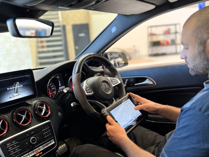 Internal shot of Mercedes service Perth expert performing diagnostics